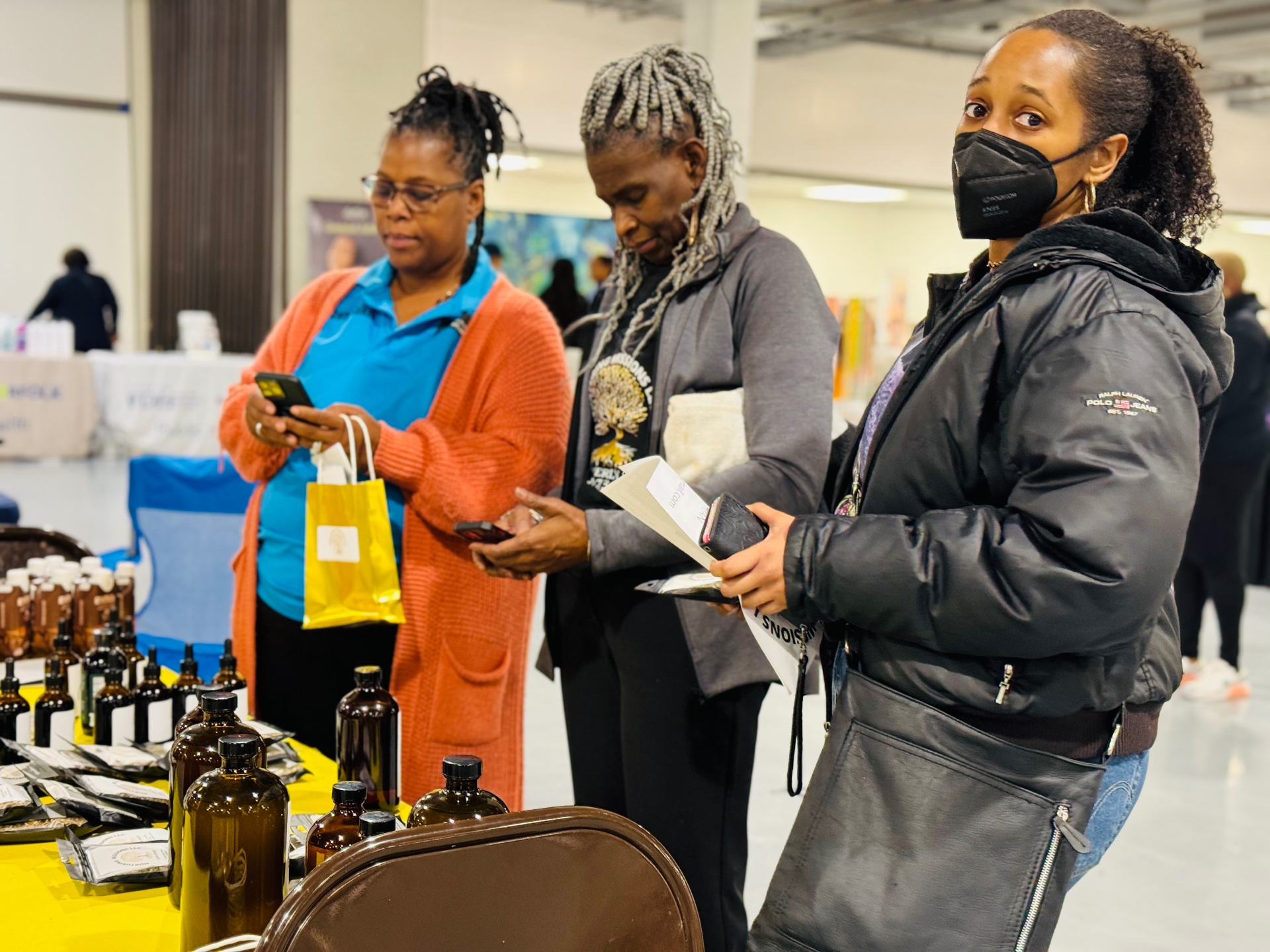 Women exploring wellness offerings at a past expo